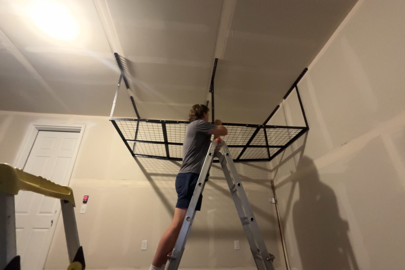 Installing an overhead storage rack into ceiling joists in a garage
