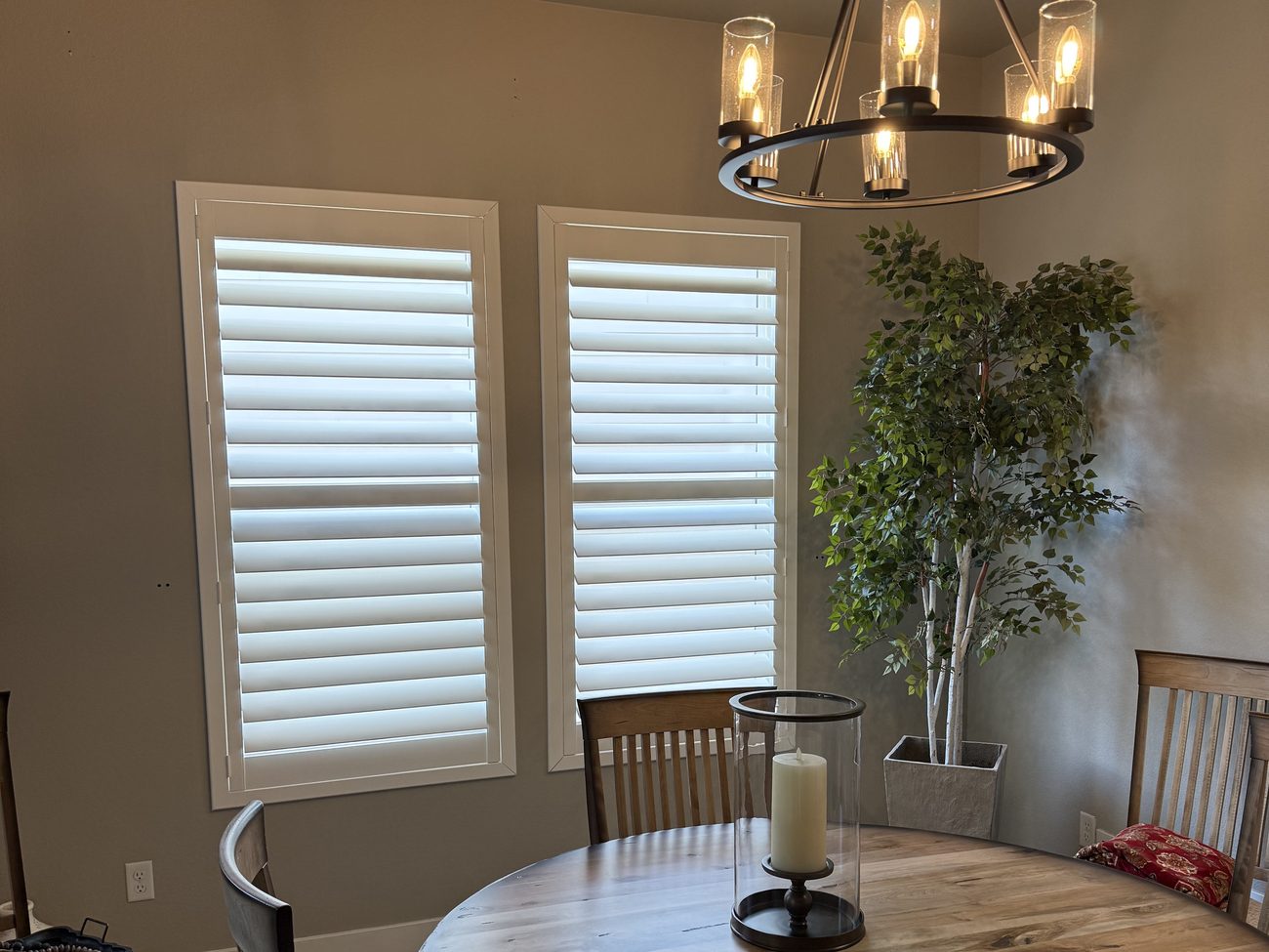 Plantation shutters installed in a dining room